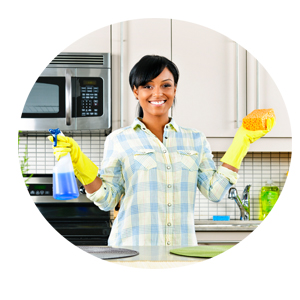 Happy housekeeper at work with gloves on